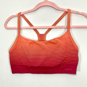 Patagonia sports bra with orange/red pattern